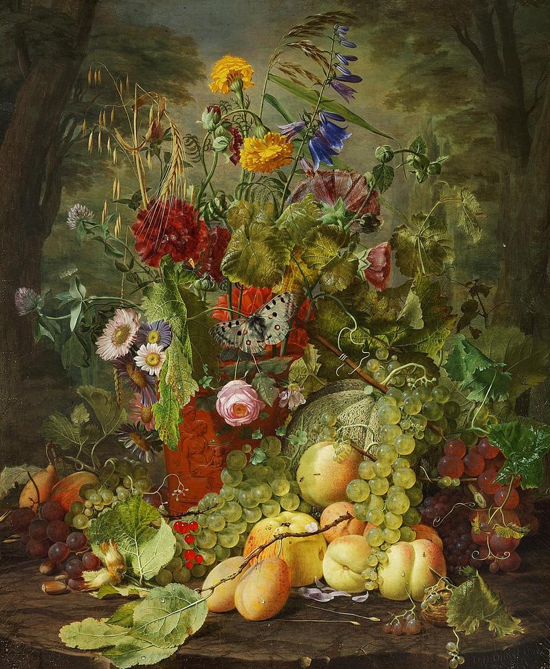 Wild flowers in a terracotta vase and fruits on a tree trunk.